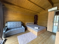 Гостевые дома «Своя поляна» - номер Деревянный домик