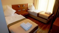 Отель «Leon» Леон - номер Стандарт с 2 односпальными кроватями фото 11