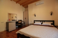 Отель «Киараз Старт» - номер Стандарт 2-комнатный с 2 двуспальными кроватями фото